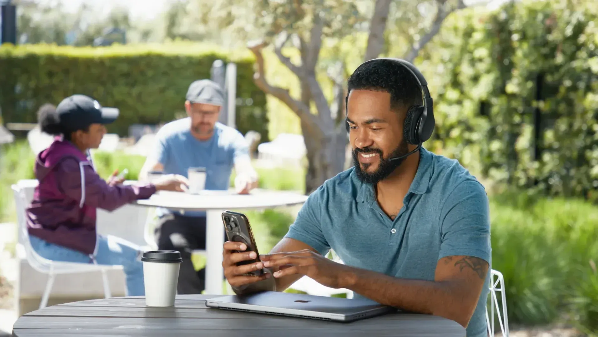 A man at a table using the soundform adapt