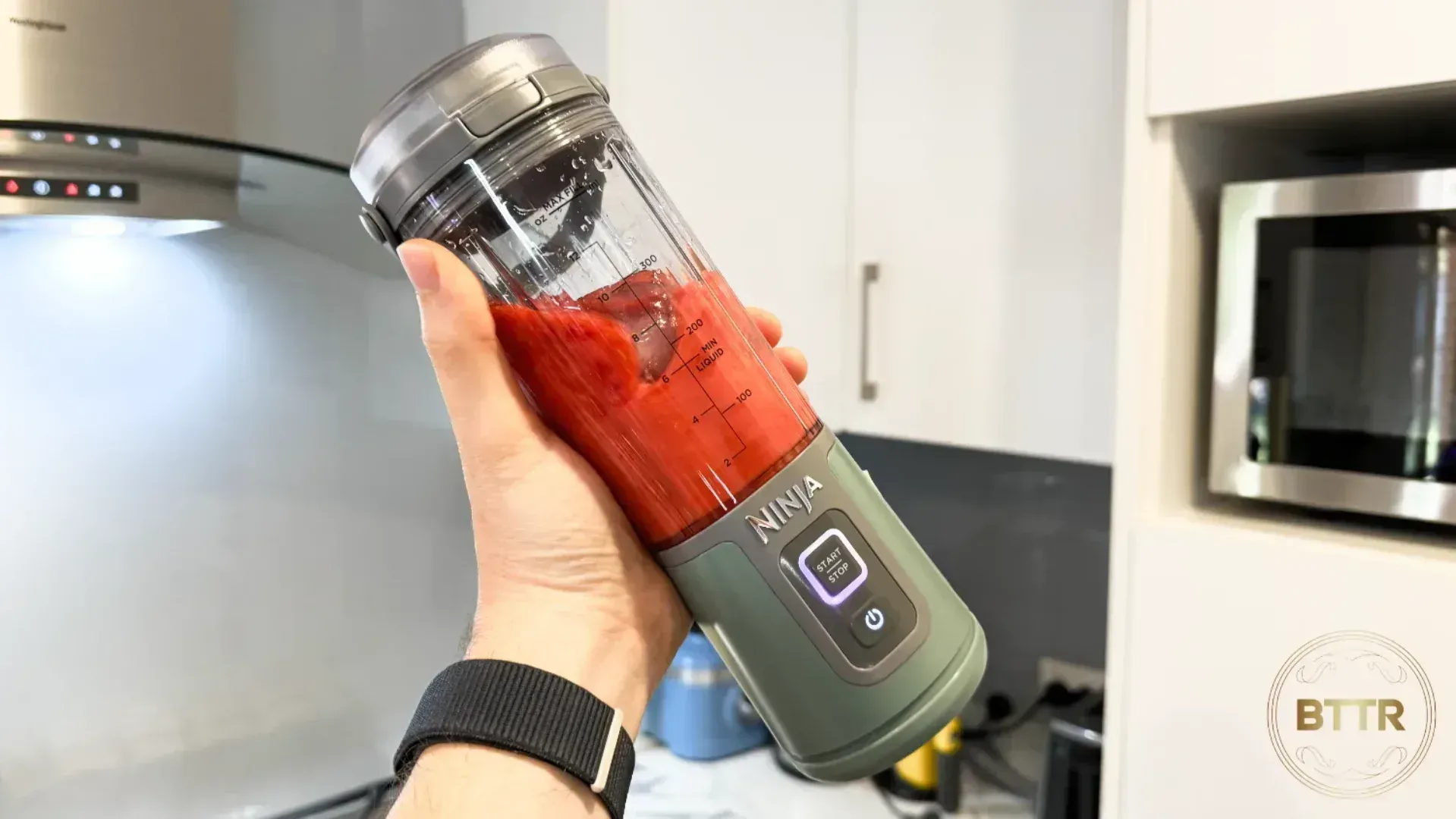 Ninja Blast blending raspberries and ice
