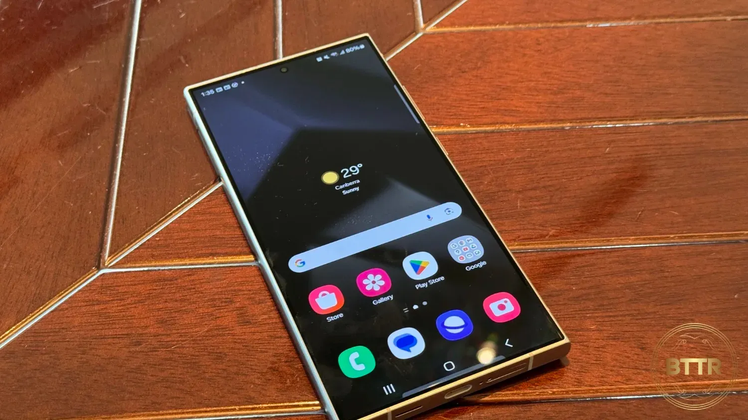 The S24 Ultra phone on a wooden table