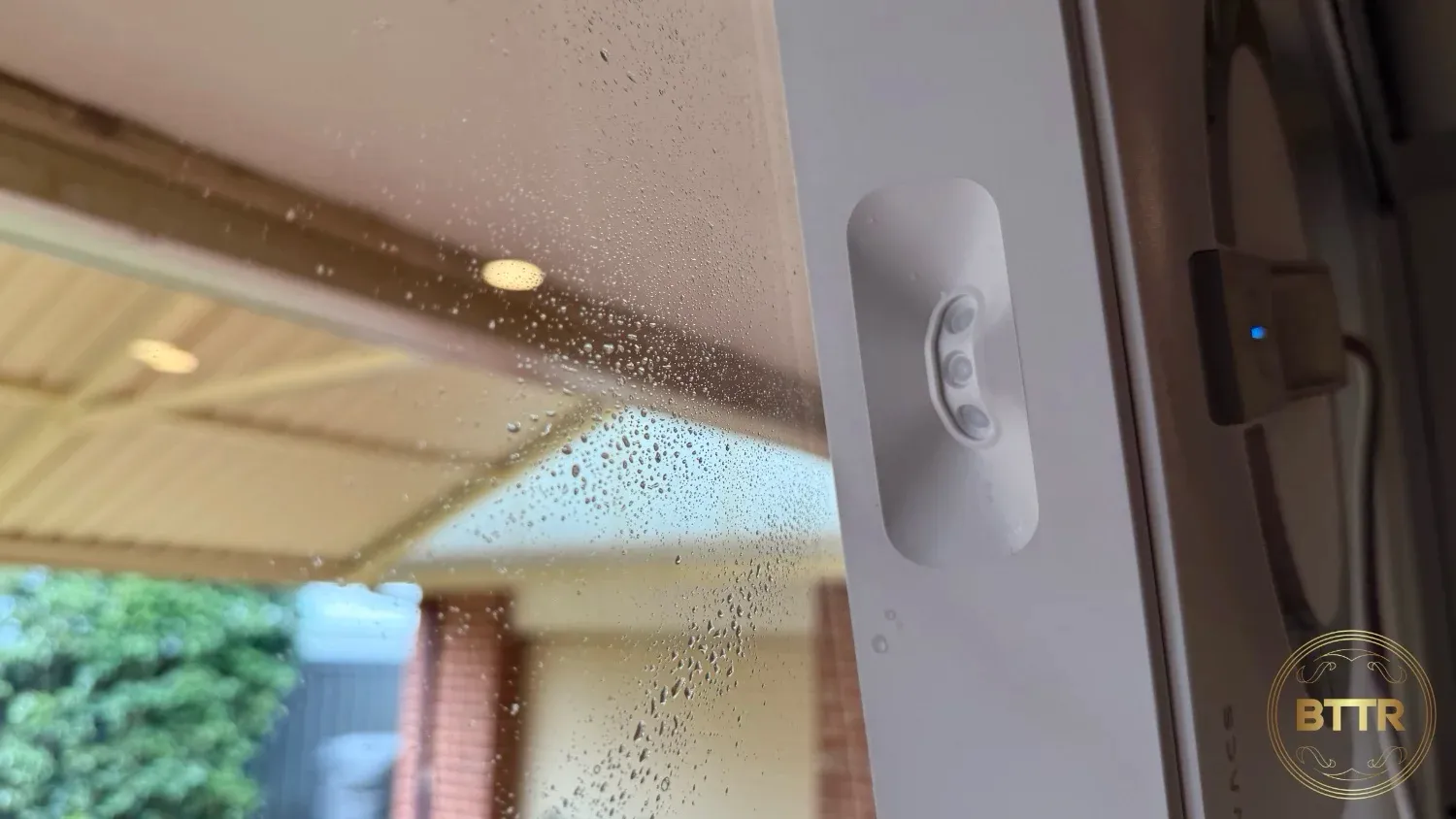 The Winbot spraying its cleaning solution.