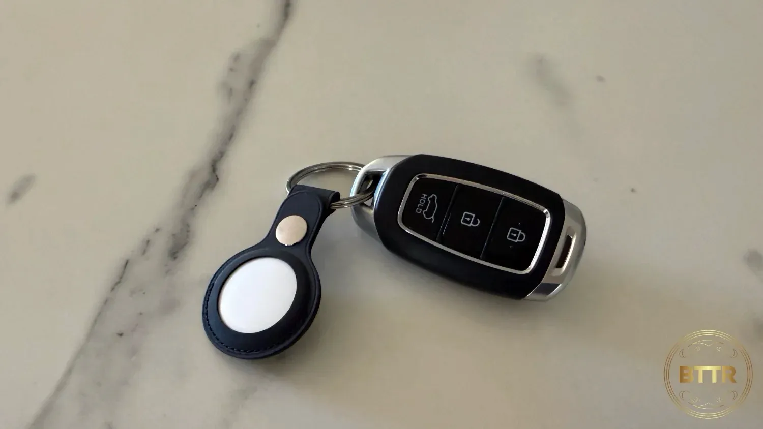 An AirTag attached to a car key