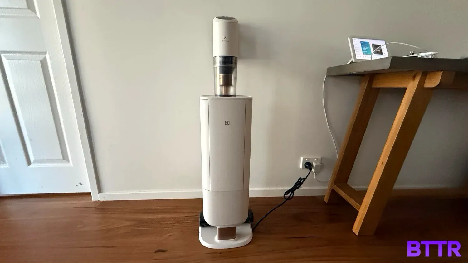 The Electrolux UltimateHome 800 stick vacuum in its dock