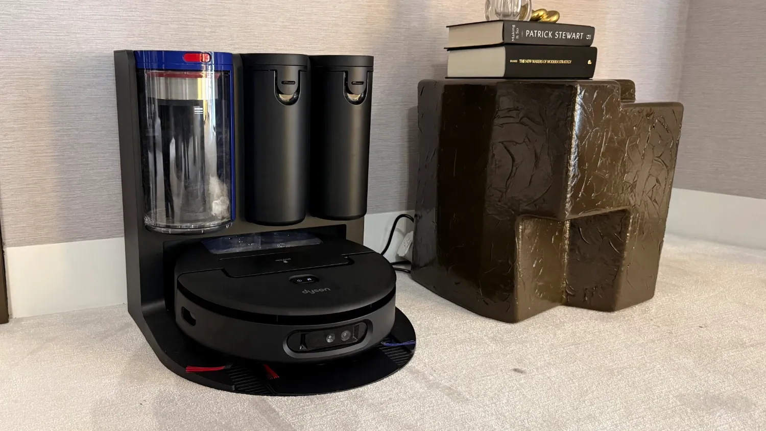 Dyson Spot+Scrub Ai robot vacuum on carpet at the Unveiled event