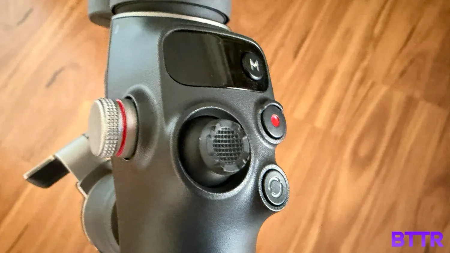 Close up of the controls on the DJI Osmo Mobile 8