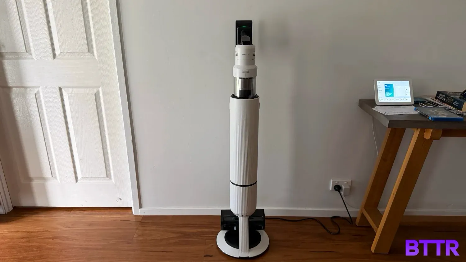 The Samsung Bespoke AI Jet Ultra stick vacuum on its base