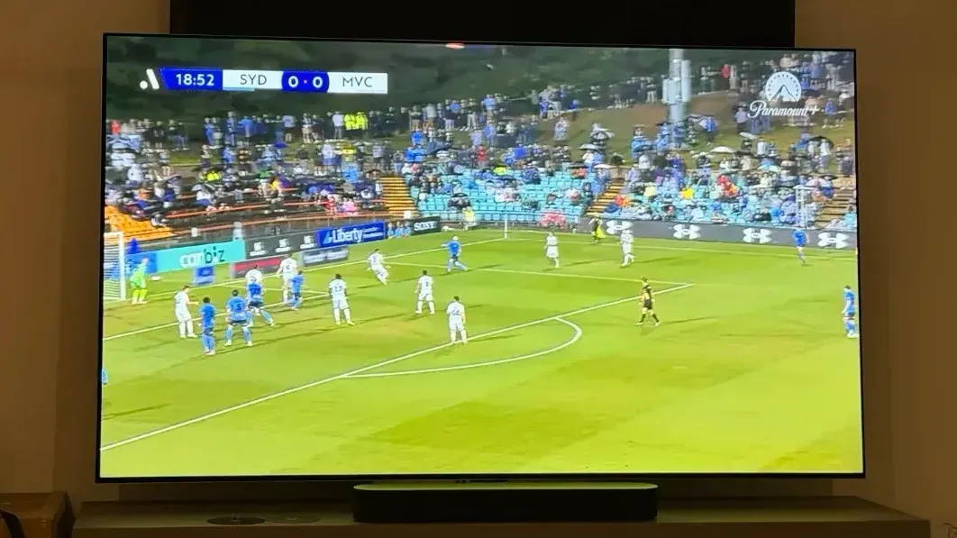 Watching football on the 77-inch display looked great