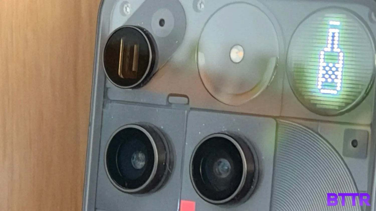 Close up of the lenses and Glyph Matrix on the Nothing Phone (3)