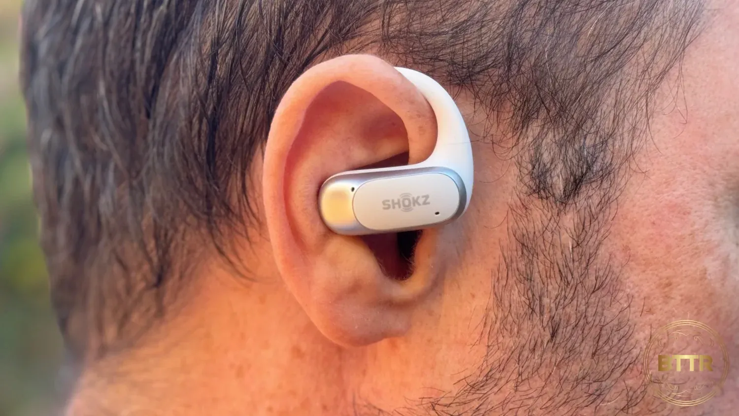 Close up wearing the Shokz OpenFit Air