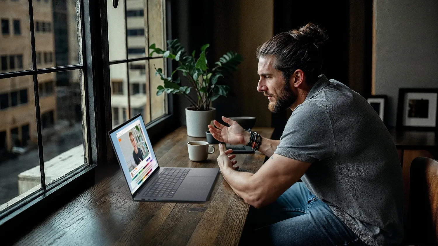 A man on a video call on the Swift Edge