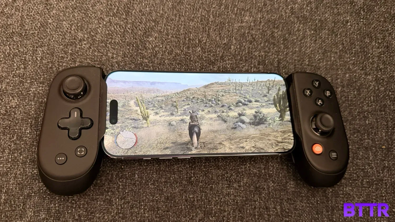 An iPhone Air in a BackBone Pro playing Red Dead Redemption