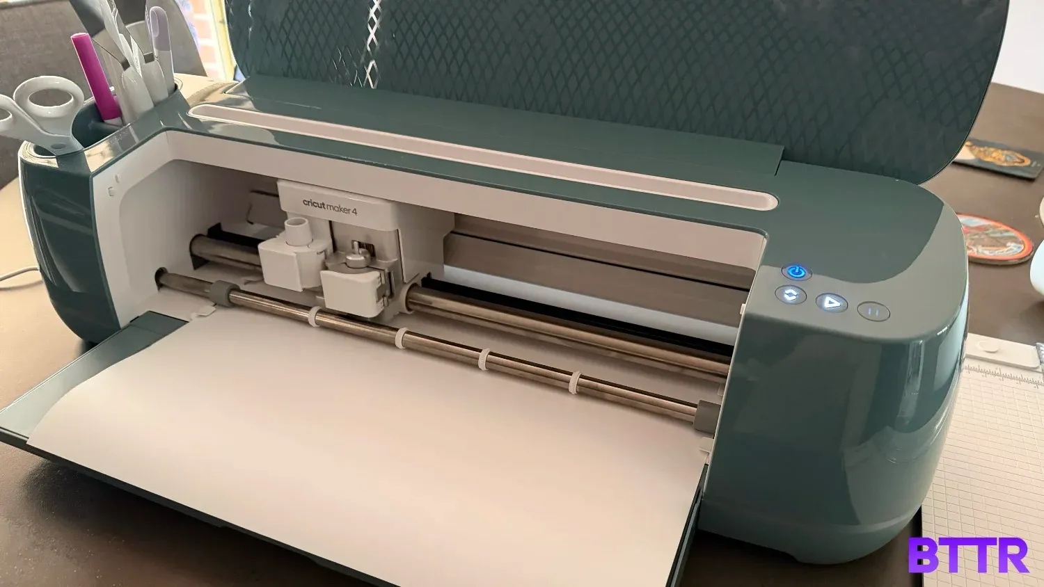 The Cricut Maker 4 doing its thing. It's pretty straightforward