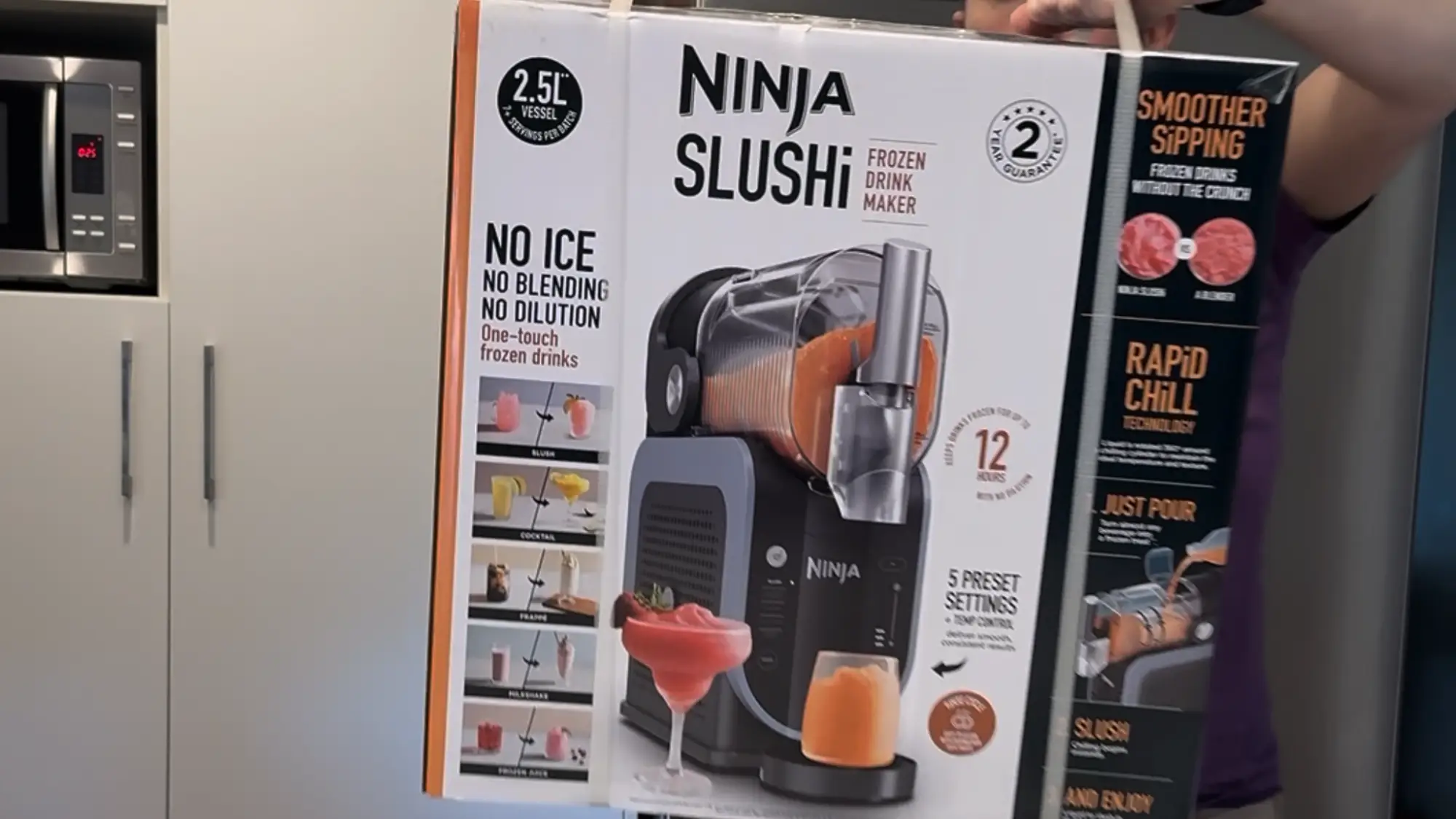 A screengrab of me unboxing the Ninja Slushi