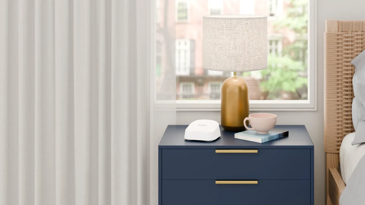 The eero 7 on a nightstand in a bedroom