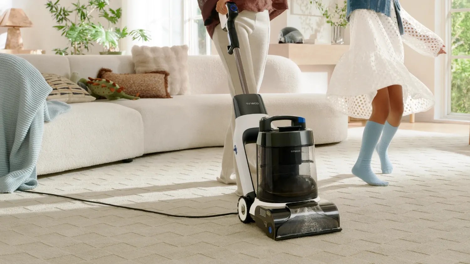 The Tineco One Cruiser cleaning carpets 