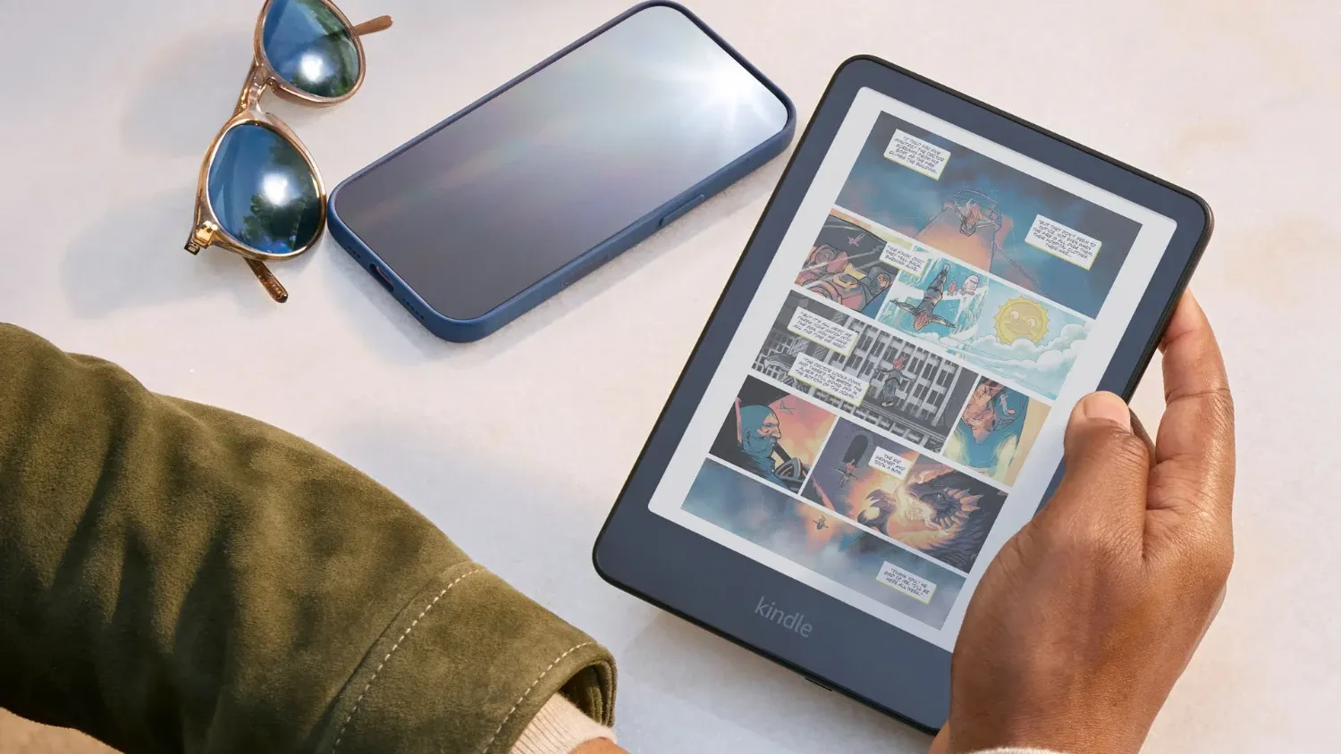 A man reading a comic on the new Kindle Colorsoft