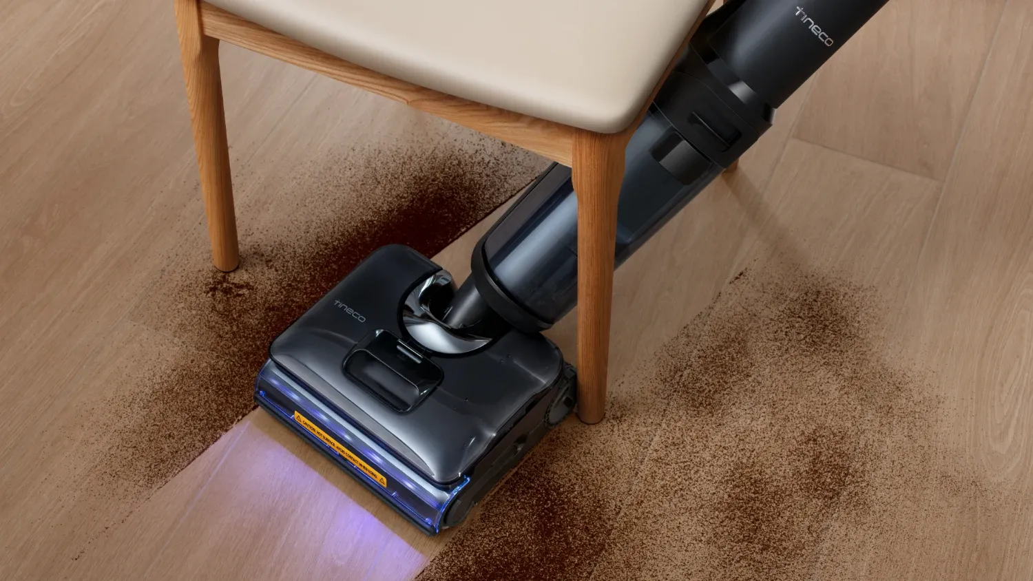 The Tineco S7 Stretch Steam cleaning under a chair