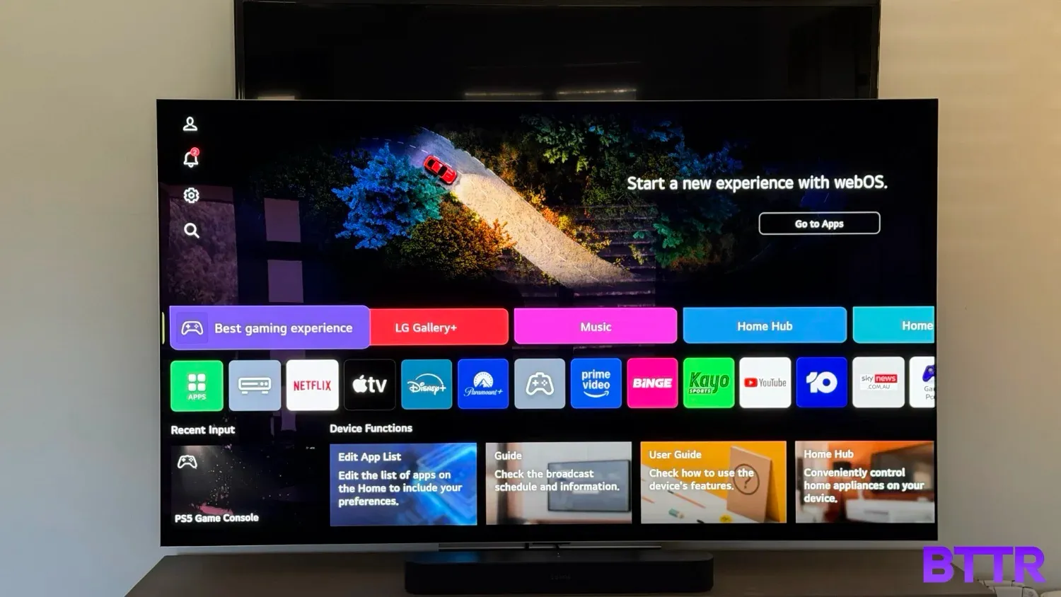 The 77-inch LG G5 OLED evo sitting in front of my old 65-inch Sony on the wall