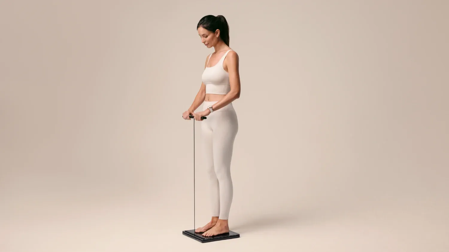 A woman on the new withings body scan 2