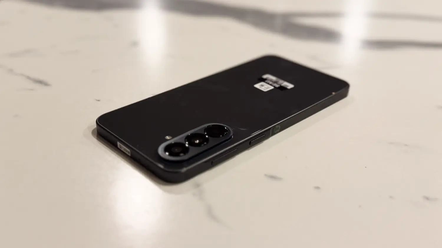 The Galaxy A37 on a faux-marble benchtop