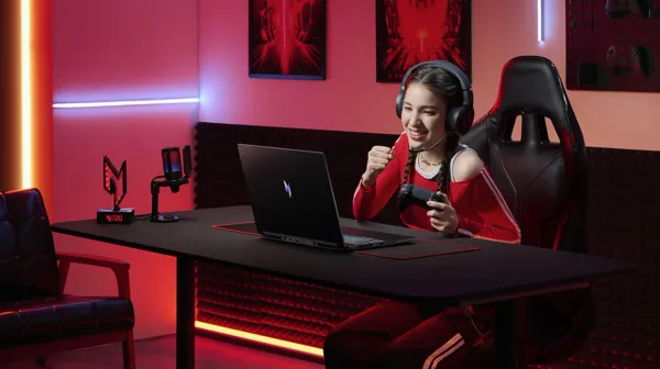 A girl gaming on the new Nitro laptop from Acer